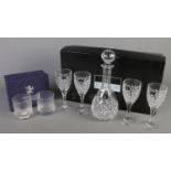 A boxed Royal Doulton Crystal wine decanter set along with two boxed Edinburgh Crystal tumblers.