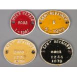Four cast iron railway wagon plates. Includes 'Inter Repair 6003 1-1967', 'Genly Repaired 6003