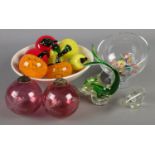 A collection of glassware. Including cranberry glass baubles, glass fruit, sweets, etc.