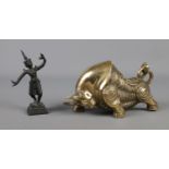 A small bronze figure of a dancer along with oriental style brass charging bull.