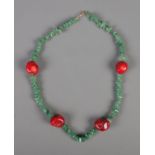 A bamboo coral and aventurine necklace.