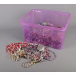 An extremely large quantity of beaded necklaces and bracelets to include jade coloured examples.