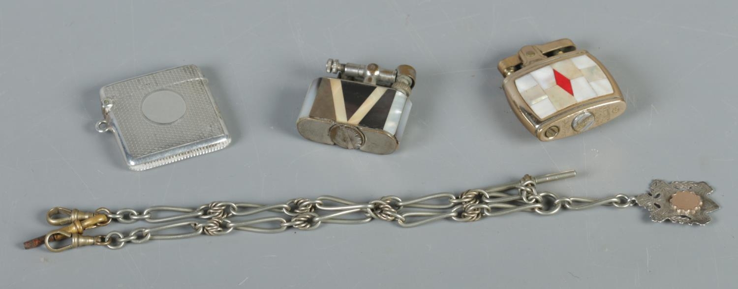 A silver bodied cigarette lighter and match strike, together with a silver plated albert chain and