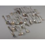 A quantity of silver plate flatware. Including ladles, sugar tongs, basting spoons, berry spoons,