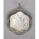 A 19th century Russian silver pendant. With central carved mother of pearl panel depicting a warrior