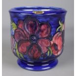 A large Moorcroft pottery planter decorated in the Anemone design. Height 17.5cm, Diameter 18cm.