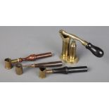 Shooting accessories; a Victorian brass shotgun cartridge capping/de-capping tool, along with