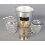 Two cut glass ice buckets along with a Brochet Hervieux ice bucket and a white metal tankard.