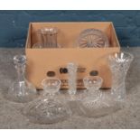 A box of assorted cut glassware. To include vases, decanter, glasses and bowls etc.