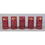 A set of five vintage Egermann etched glasses with cranberry colour overlay. 13cm high. Four of