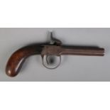 A 19th century percussion cap pistol. Length 19cm. CANNOT POST OVERSEAS Mechanism not working.