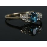 A 9ct Gold 'London Blue' topaz and diamond ring, size JÂ½. Total weight: 1.2g Slight scratches to