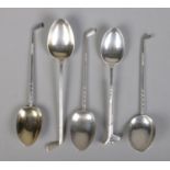 Five early to mid 20th century silver golf themed tea spoons, various assay marks. Including