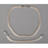A silver chain and matching bracelet. Marked Milor 925 Italy. 41g.