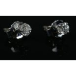 A pair of 18ct white gold diamond stud earrings. Diamond 0.43 carat.