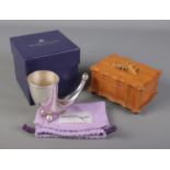 A boxed Hamilton & Inches white metal horn along with a Swiss musical jewellery box.