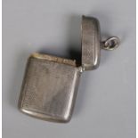 A Victorian silver vesta case, assayed for Birmingham 1899 by George Unite. Monogramed CE to