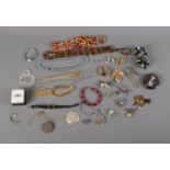 A quantity of costume jewellery including necklaces, bracelets, Accua wristwatch and, possibly