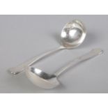 A pair of silver ladles. Assayed Sheffield 1932 by Cooper Brothers & Sons Ltd. 69g.