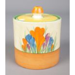 A Newport Pottery Clarice Cliff Bizarre preserve pot and cover decorated in the Crocus design.