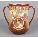 A large Royal Doulton limited edition Loving Cup commemorating the coronation of Queen Elizabeth II.