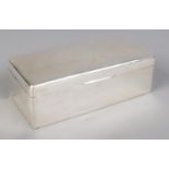 A George V silver cigarette/cigar box. Assayed Birmingham 1911 by A & J Zimmerman Ltd. Height 6cm