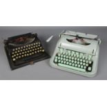 Two cased typewriters. Including Hermes 3000 and Remington Portable.