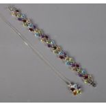 A silver multicoloured stone set bracelet and pendant on chain.