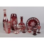 A quantity of cut and etched ruby glassware, to include large vase, decanter and dish. One stopper