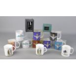 A box of ceramic and crystal mugs with military insignias, mostly Parachute Regiment.
