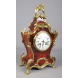 A 19th century French Japy Frere's eight day red tortoiseshell mantel clock with ormolu mounts.