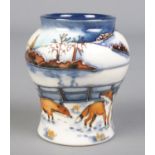 A small Moorcroft baluster shaped vase by Anji Davenport. Decorated in the 'Woodside Farm'