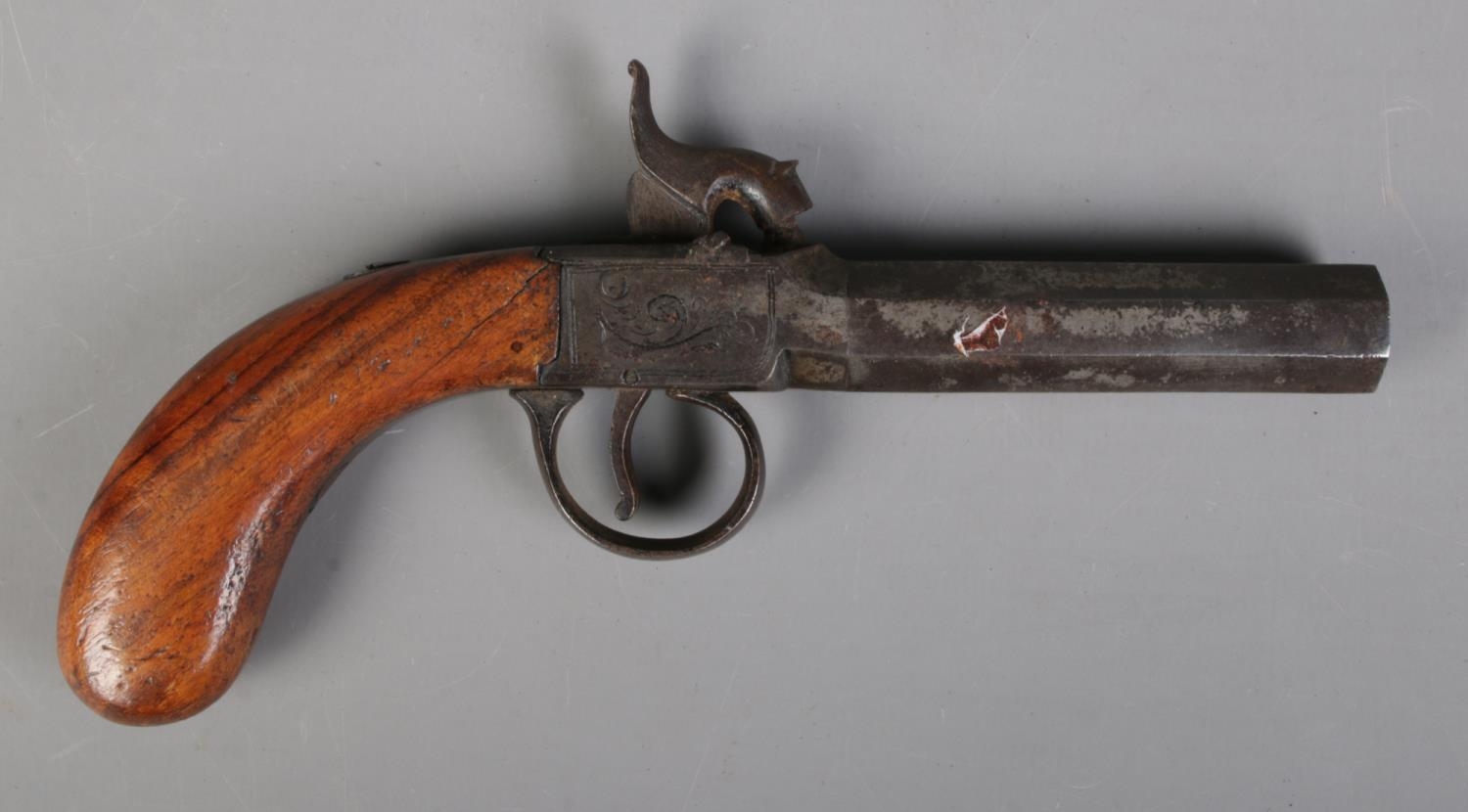 A 19th century percussion cap pistol with octagonal barrel. Bearing Birmingham proof marks. Length