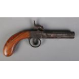 A 19th century percussion cap pistol with octagonal barrel. Bearing Birmingham proof marks. Length