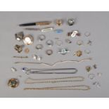 A collection of assorted jewellery including silver examples. Includes earrings, rings, necklaces
