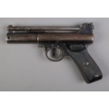The Webley "Mark I" 0.177cal air pistol, with chequered grip. Stamped 58 to the body. CANNOT POST