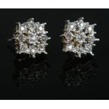 A pair of 9ct gold diamond cluster stud earrings.