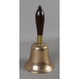 A vintage brass school bell.