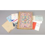 A collection of assorted stamps, ephemera and vintage photograph album of various places in Great