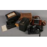 A quantity of cameras. Including Eastman Pocket Kodak, Kodak Brownie, boxed Johnson Capacitor