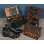 Two WWII field telephones Set 'F' along with a metal ammo crate and pair of boots.