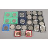 A quantity of commemorative coins, to include silver jubilee, Charles and Diana examples and 100th
