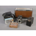 A Philips portable radio along with Stellar and Sharp Transistors and two Kodak Brownie's.