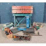 A large collection of tools, to include Workmate bench, electric sanders, tap and die set, spanners,