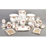 A quantity of Royal Albert Old Country Roses ceramics. Includes vases, bowls, candlesticks,