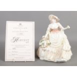 A Limited Edition Coalport figure; 'Harvest Gold'. No. 1200/7500. In good condition, with