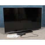 A Panasonic 49" TX-49GX550B Smart TV, with remote and instruction manual. In working order.