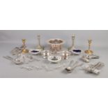 A good collection of metalwares, to include candlesticks, wine coaster, mustard pots with spoons,