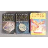 Three hardback Harry Potter books, by J.K. Rowling - all first editions. To include the Half Blood