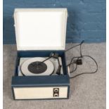 A fidelity portable record player.